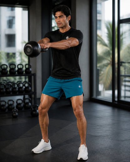 Athleia Apex Shorts with Flow Tee Black in the gym – worn by a man