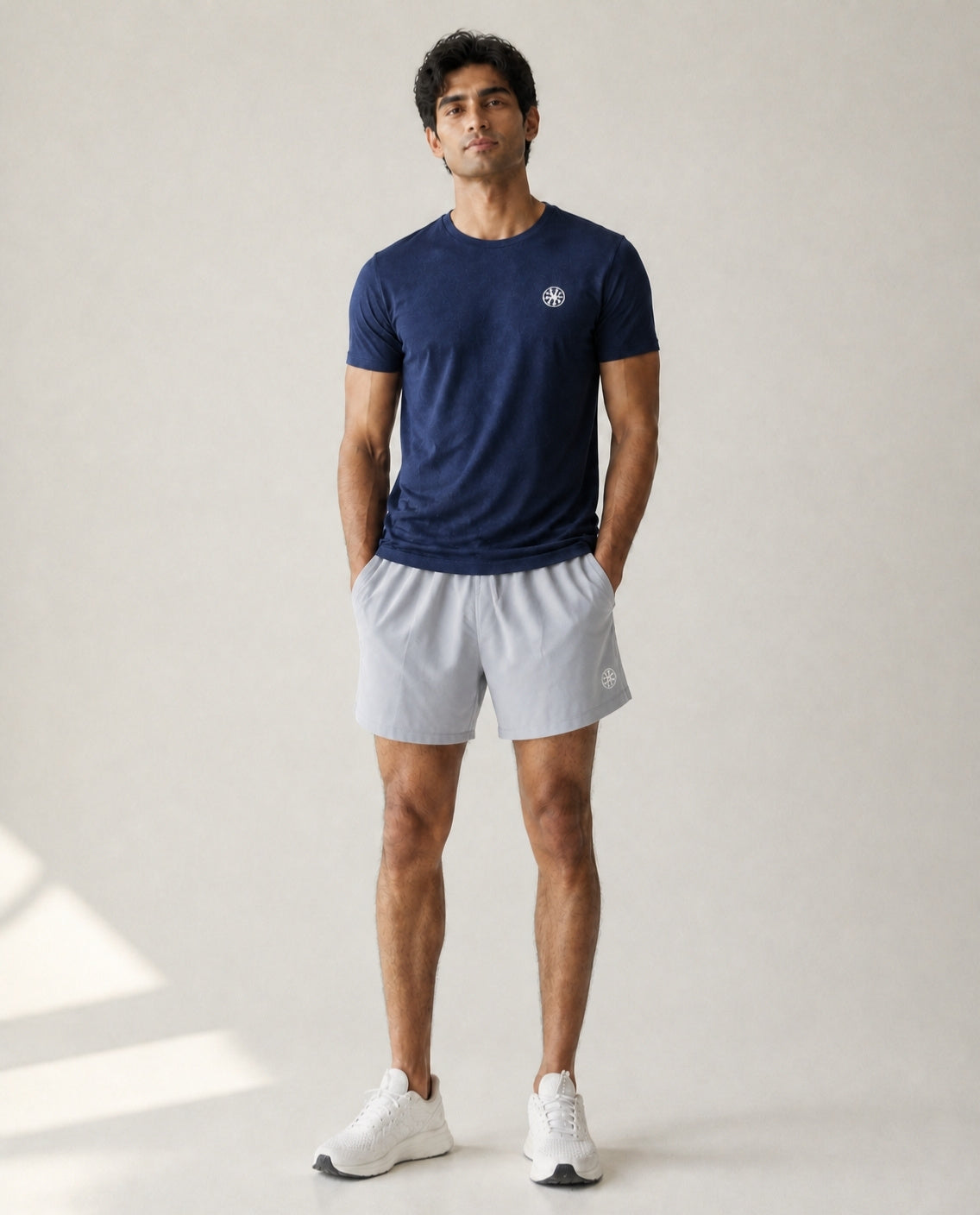 Athleia Pulse Shorts Rhino Grey with Seamless Jacquard Dark Blue – worn by a man