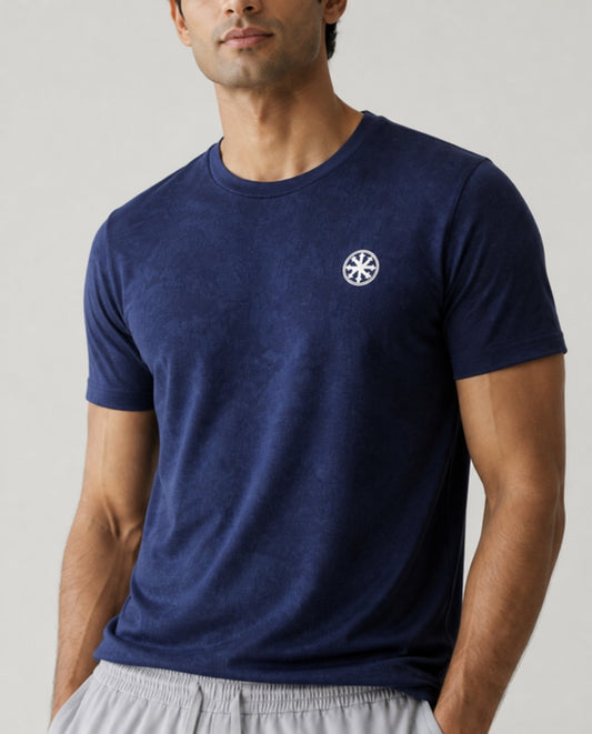 Athleia catalogue shoot – jacquard tee dark – detail – worn by a man