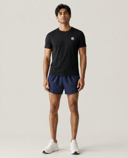Athleia catalogue shoot – sprintlite shorts navy – front – worn by a man